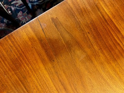Lot 571 - A large George III figured mahogany extending dining table in the manner of Gillows