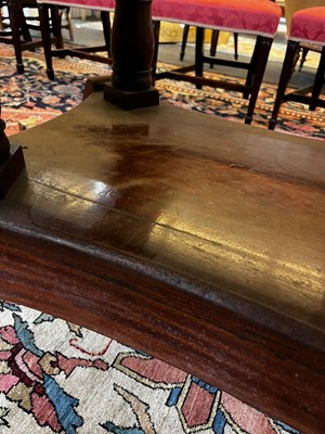 Lot 571 - A large George III figured mahogany extending dining table in the manner of Gillows
