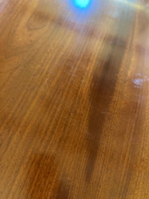 Lot 571 - A large George III figured mahogany extending dining table in the manner of Gillows