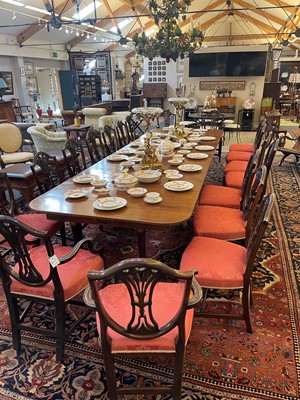 Lot 571 - A large George III figured mahogany extending dining table in the manner of Gillows