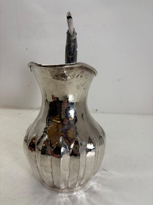 Lot 46 - A Mexican silver-plated 'Toucan' water jug