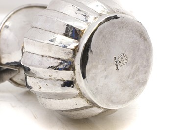 Lot 46 - A Mexican silver-plated 'Toucan' water jug