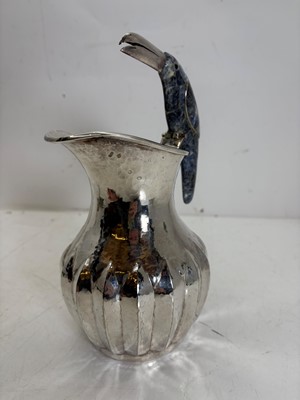 Lot 46 - A Mexican silver-plated 'Toucan' water jug