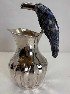 Lot 46 - A Mexican silver-plated 'Toucan' water jug