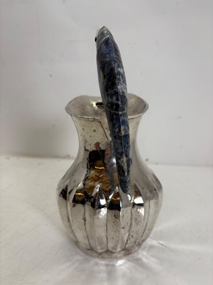 Lot 46 - A Mexican silver-plated 'Toucan' water jug