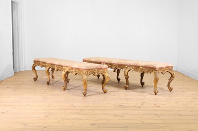 Lot 18 - A pair of carved giltwood and gesso stools or hall seats