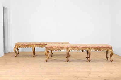 Lot 18 - A pair of carved giltwood and gesso stools or hall seats