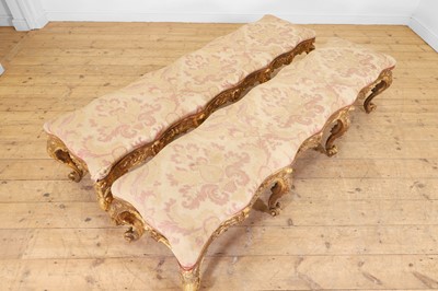 Lot 18 - A pair of carved giltwood and gesso stools or hall seats