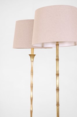 Lot 67 - Two polished brass faux bamboo floor lamps