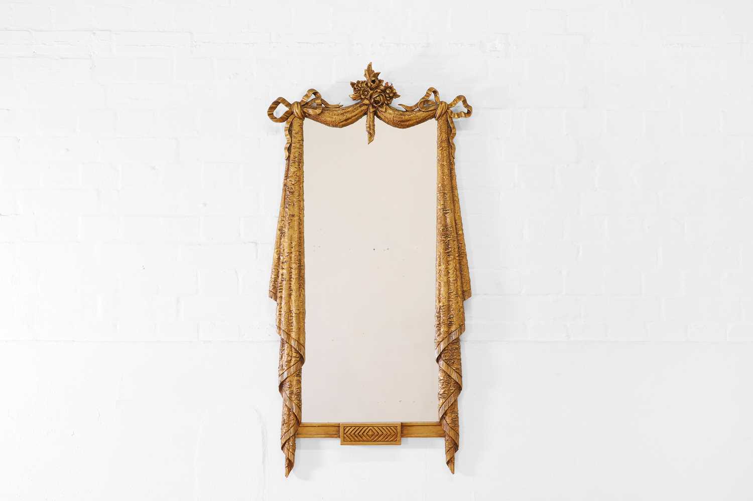 Lot 71 - A carved giltwood and composition pier mirror