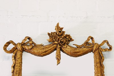 Lot 71 - A carved giltwood and composition pier mirror