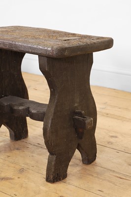 Lot 48 - A set of eight rustic oak stools