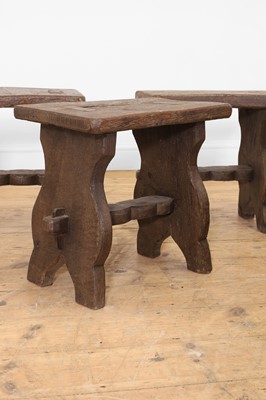 Lot 48 - A set of eight rustic oak stools