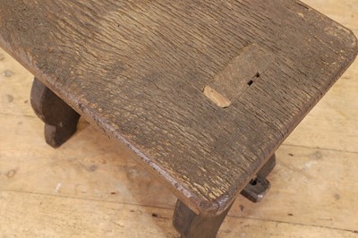 Lot 48 - A set of eight rustic oak stools