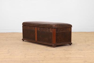 Lot 476 - A walnut and studded leather ottoman