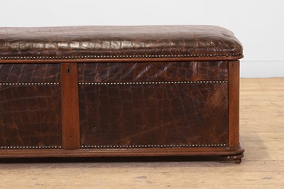 Lot 476 - A walnut and studded leather ottoman