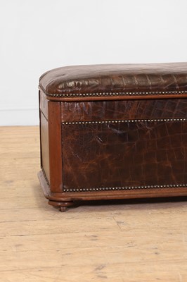 Lot 476 - A walnut and studded leather ottoman