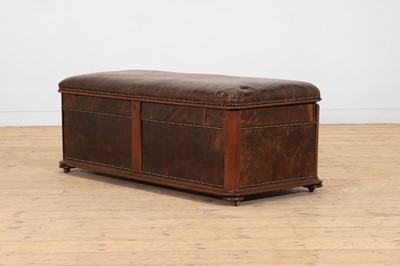 Lot 476 - A walnut and studded leather ottoman