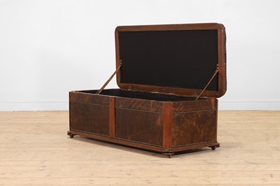 Lot 476 - A walnut and studded leather ottoman