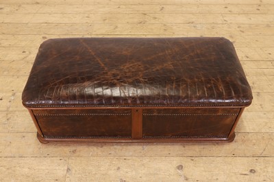 Lot 476 - A walnut and studded leather ottoman