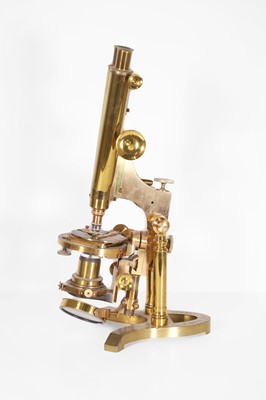 Lot 187 - A brass binocular microscope