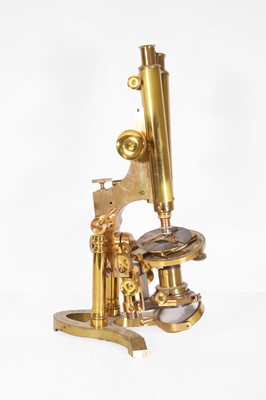 Lot 187 - A brass binocular microscope
