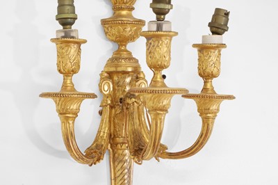 Lot 63 - A pair of Louis XVI-style carved giltwood and composition wall lights