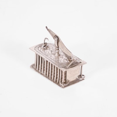 Lot 310 - A Dutch silver miniature mousetrap