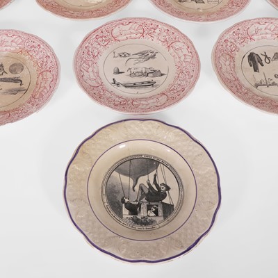 Lot 299 - A set of twelve rebus plates