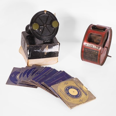 Lot 51 - A newspaper acting-picture machine