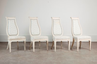 Lot 21 - A set of four chalk white painted and upholstered dining chairs