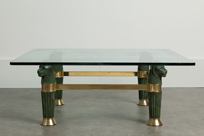Lot 16 - A glass-topped coﬀee table