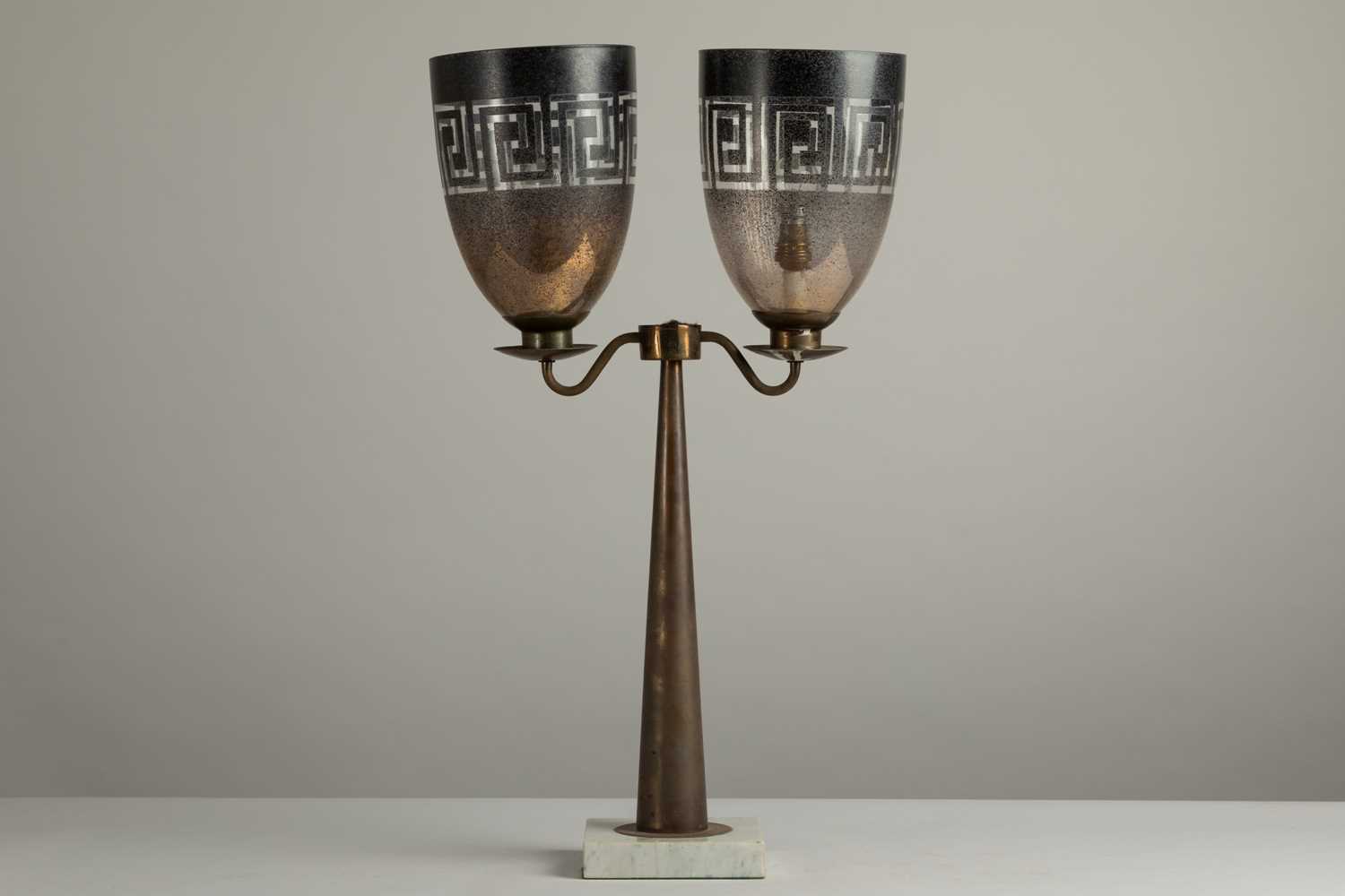 Lot 394 - A neoclassical brass table lamp