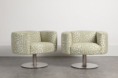 Lot 337 - A pair of revolving armchairs