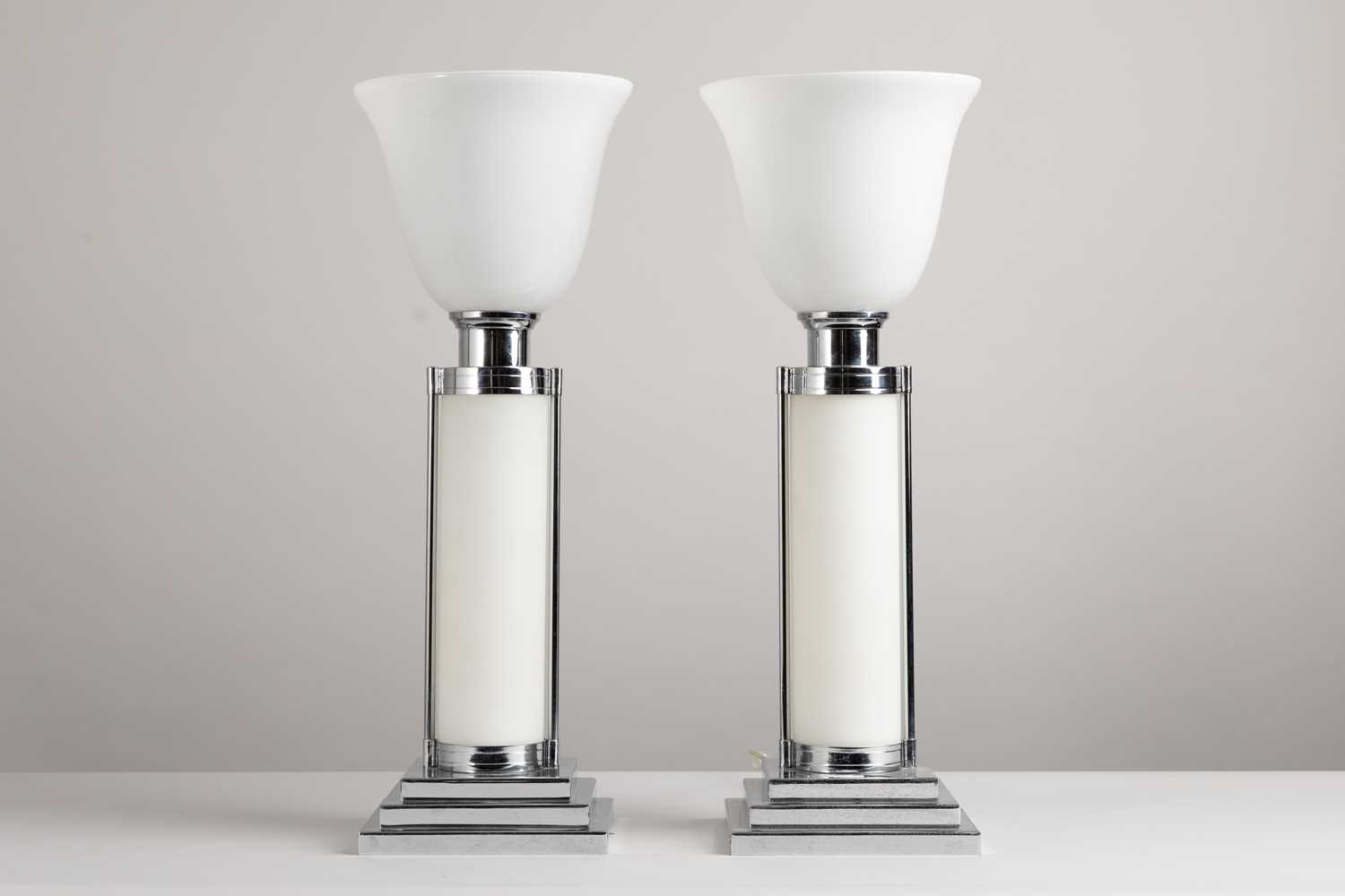 Lot 2 - A pair of Art Deco-style chrome uplighter table lamps
