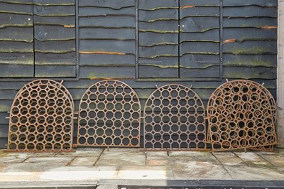 Lot 447 - A set of eight arched cast iron panels