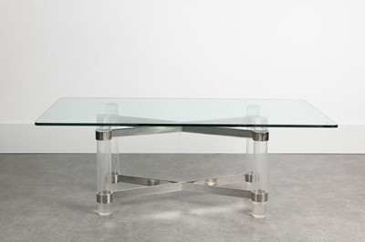 Lot 19 - A Lucite and chromed-steel dining table