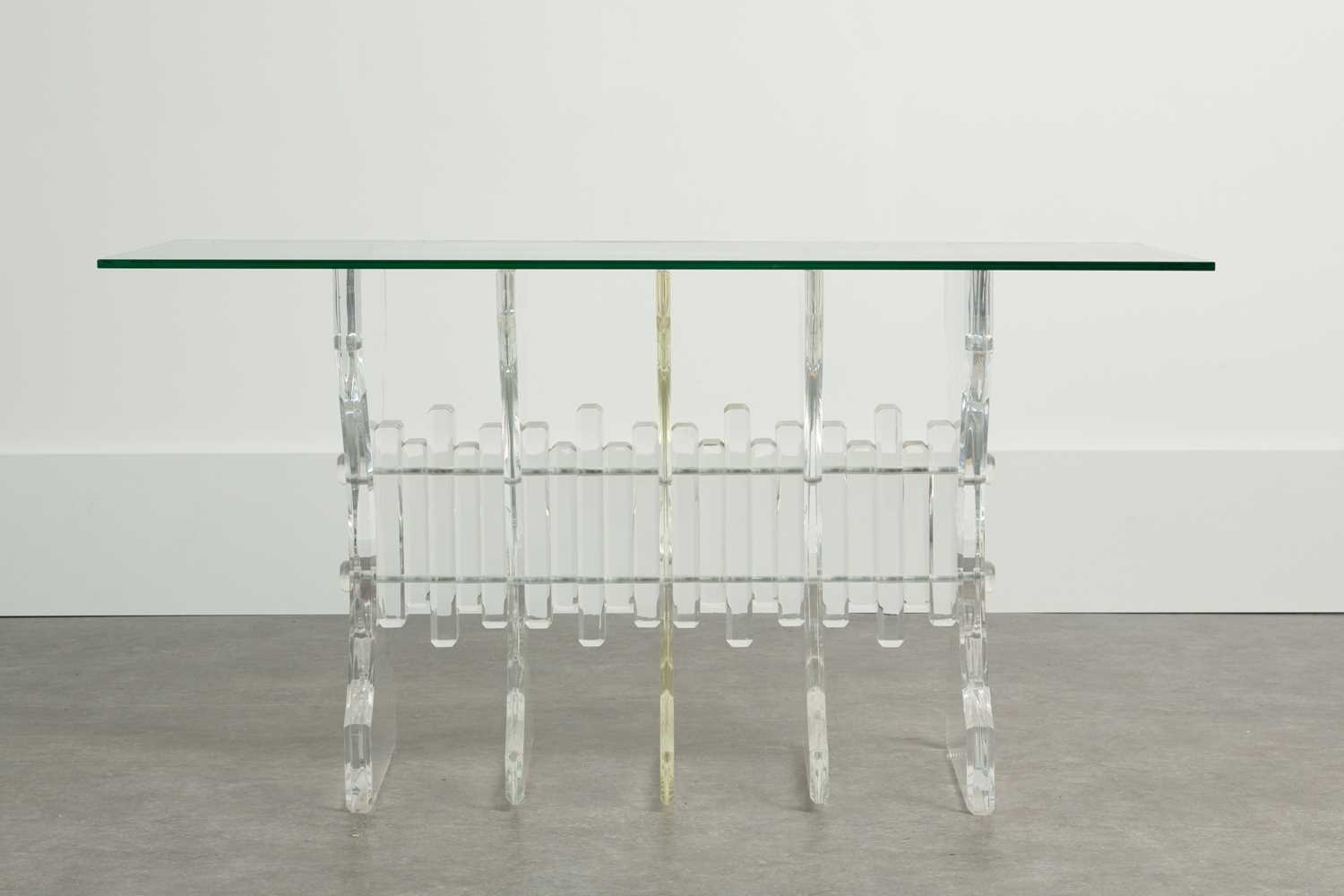 Lot 50 - A Lucite and glass dining table