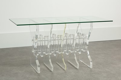 Lot 50 - A Lucite and glass dining table