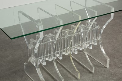 Lot 50 - A Lucite and glass dining table