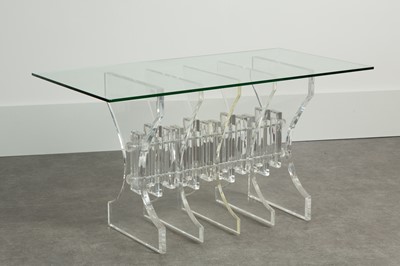 Lot 50 - A Lucite and glass dining table