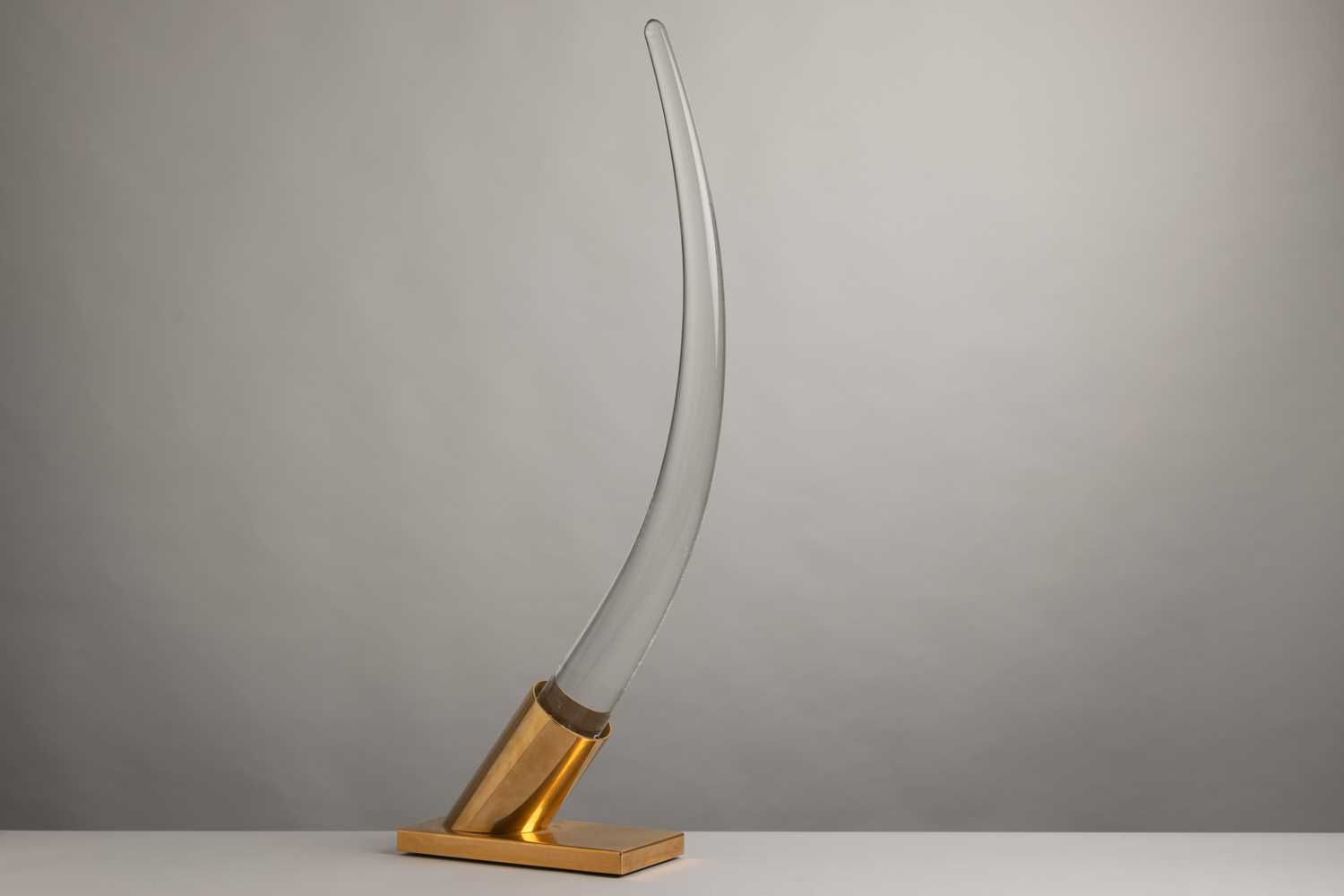 Lot 151 - A large Lucite sculptural 'tusk' table lamp