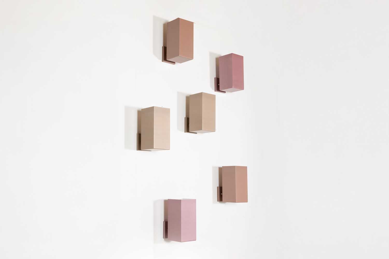 Lot 24 - A set of six aluminium uplighters