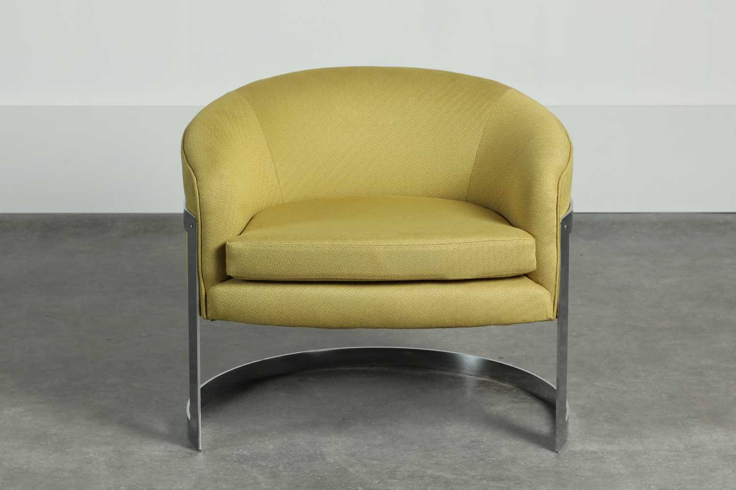 Lot 51 - A steel and upholstered armchair