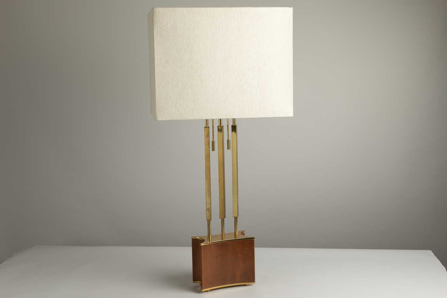Lot 10 - A brass and wood table lamp