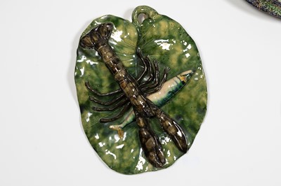 Lot 185 - A Palissy ware shaped plaque