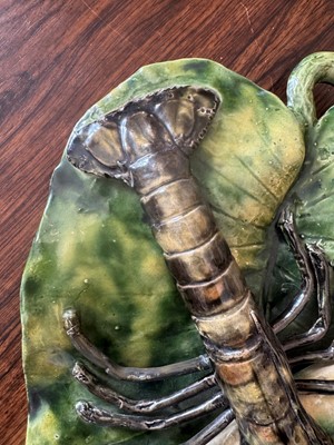 Lot 185 - A Palissy ware shaped plaque