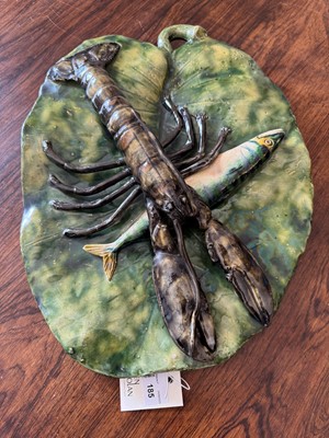 Lot 185 - A Palissy ware shaped plaque