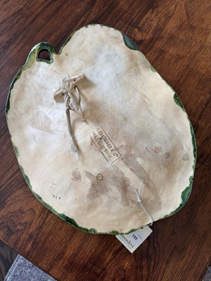 Lot 185 - A Palissy ware shaped plaque