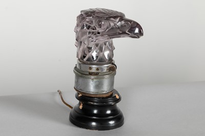 Lot A mauve crystal 'Tête d'Aigle' car mascot by René Lalique